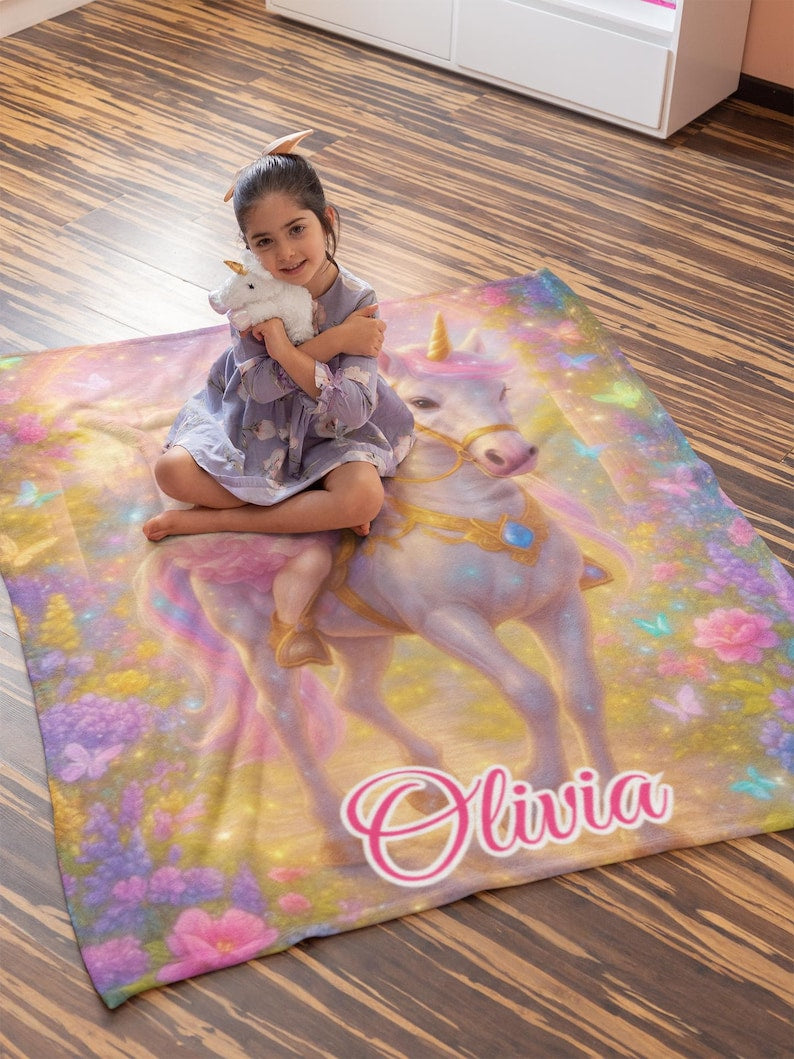 Unicorn blanket folded showing design