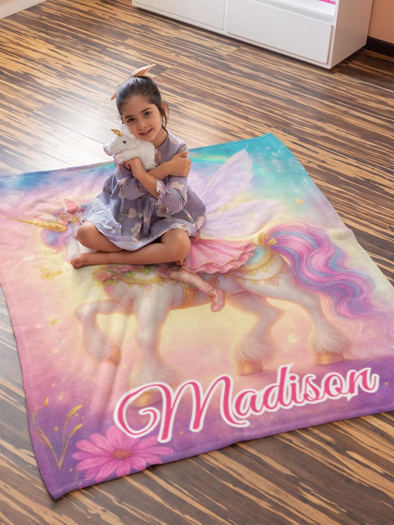 Unicorn fairy blanket on bed